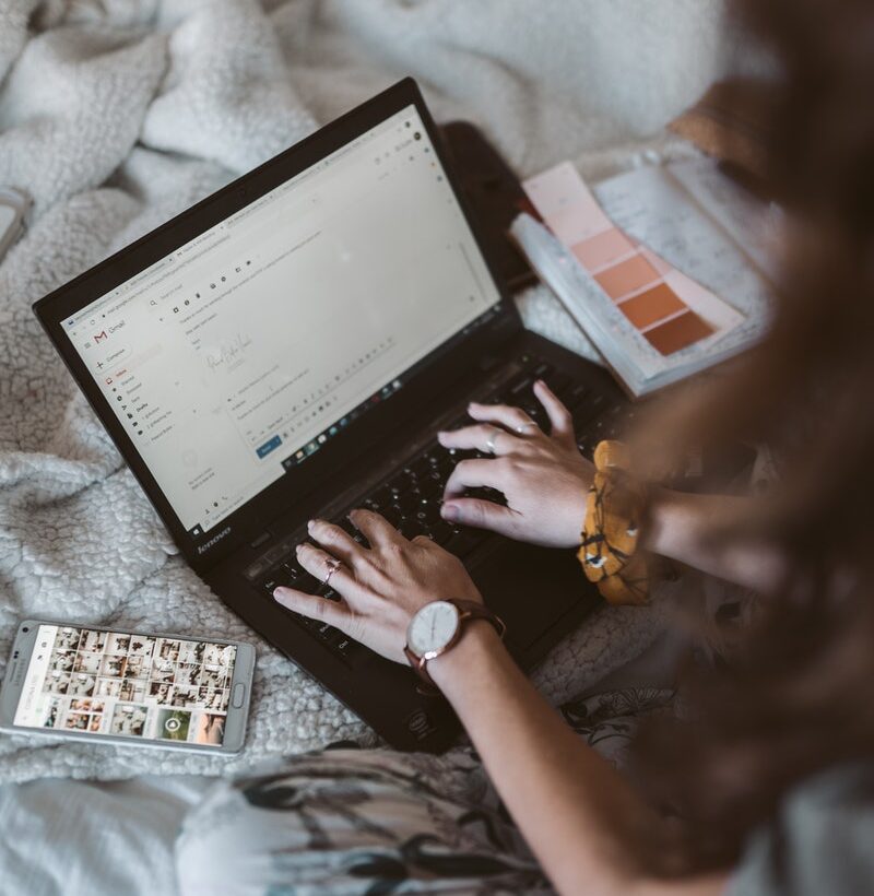 Photo Of Person Using Black Laptop